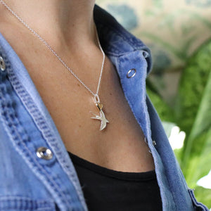 Silver plated swallow necklace with golden heart