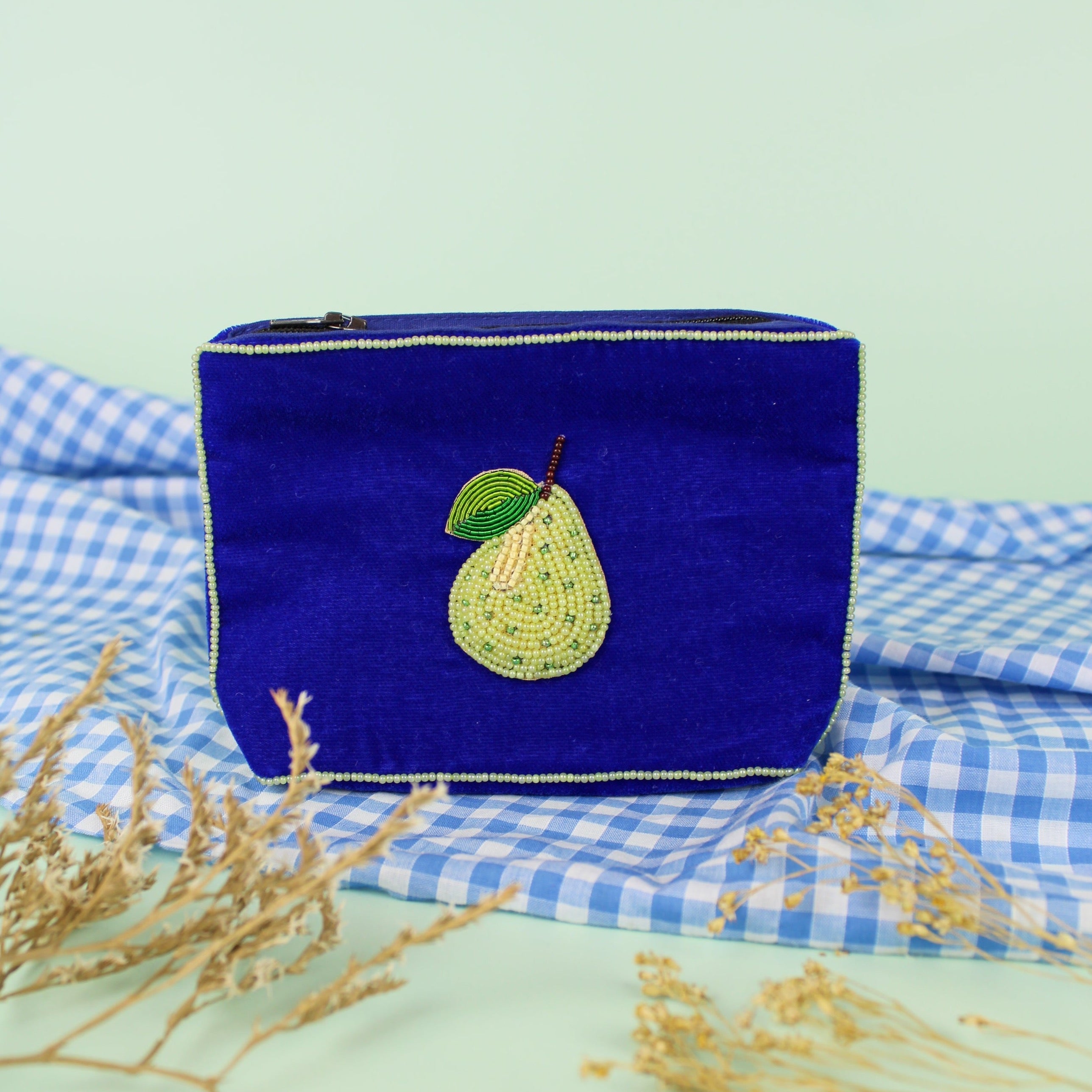 The Luxury Sapphire Velvet Hand-Beaded Purse with Pale Green Pear Design