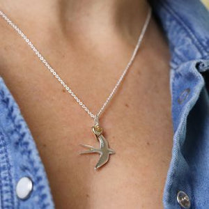 Silver plated swallow necklace with golden heart